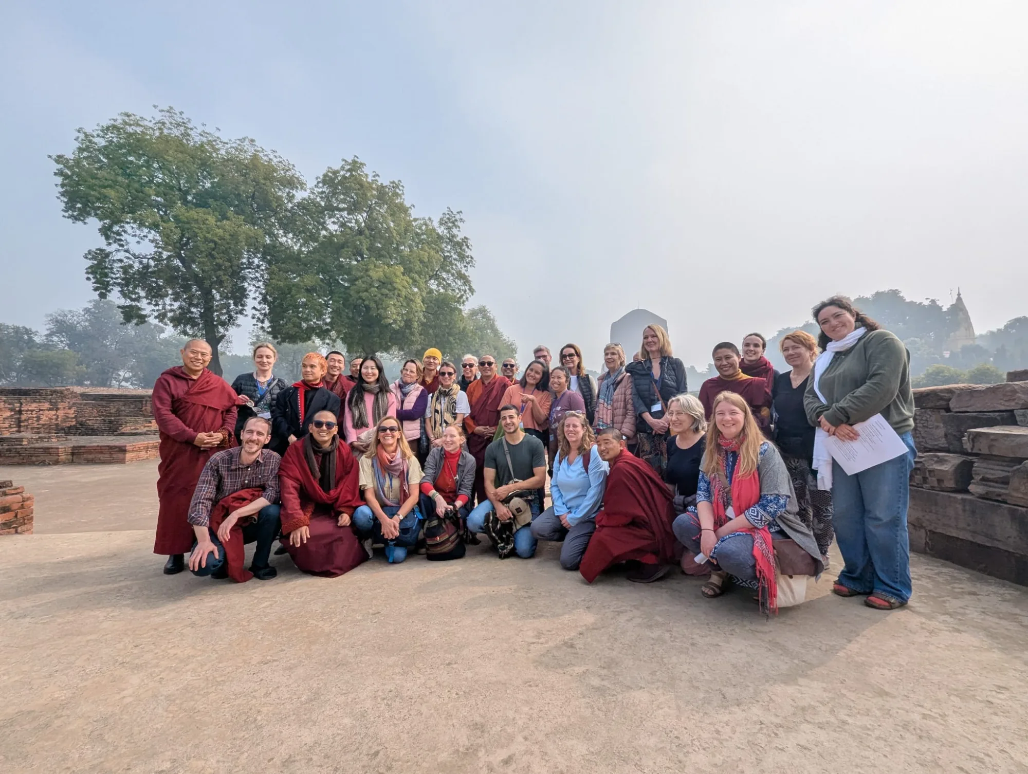 FNT 2025 participants group photo at Dhamek Stupa